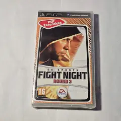 Okładka gry Fight Night Round 3 na PSP. Bokser w kapturze, gotowy do walki. Idealna dla fanów gier sportowych na PS5.
