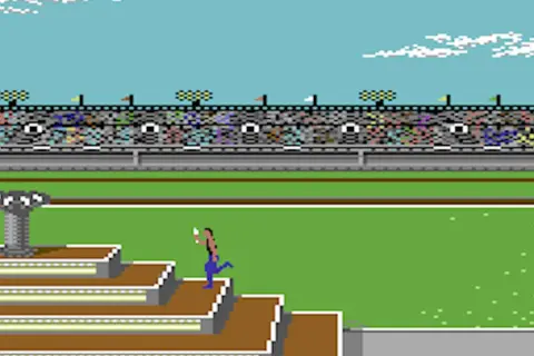 Biegacz na schodach stadionu, klasyczne gry na Commodore 64. Widownia kibicuje.