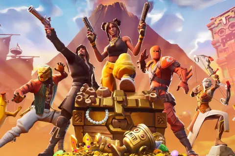 Postacie z gry Fortnite wokół skrzyni ze skarbami i złotymi monetami.