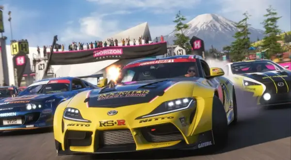 Wyścigowe samochody na festiwalu Horizon. Zastanawiasz się, ile waży Forza Horizon 5? To gra, która waży sporo gigabajtów, ale dostarcza niezliczone godziny zabawy!