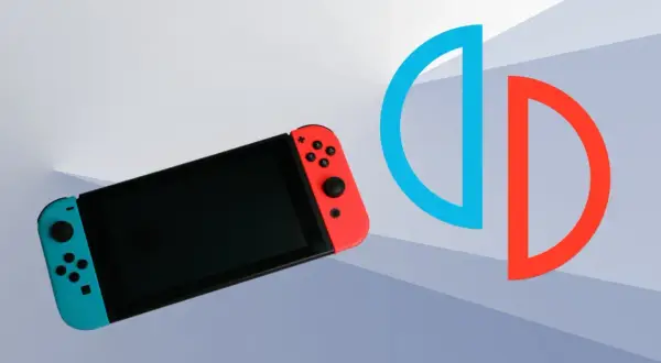 Konsola Nintendo Switch z niebieskim i czerwonym Joy-Conem obok symbolu podzielonego okręgu.