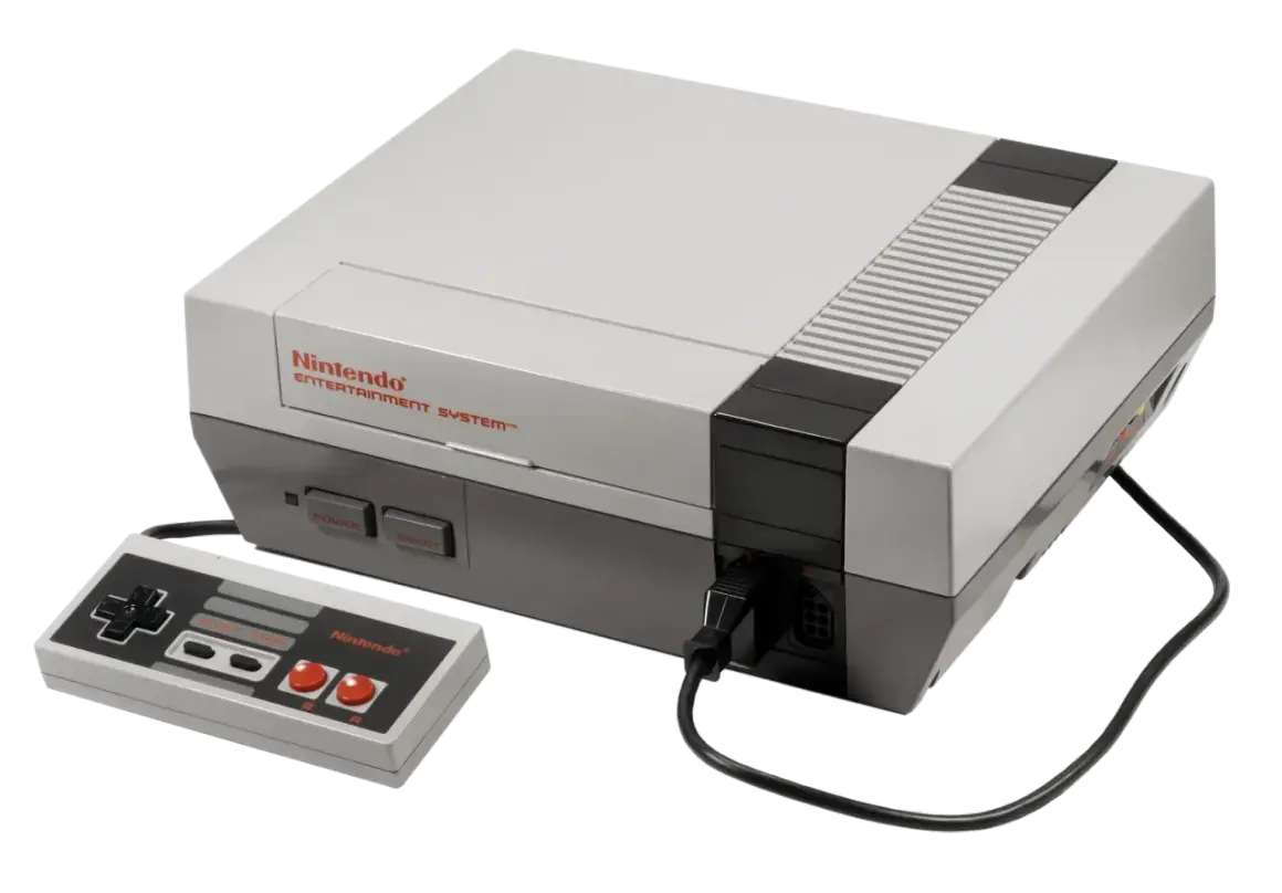 Klasyczna konsola Nintendo Entertainment System z padem. Wiele osób wspomina ją jako swoje pierwsze **stare gry na telefon**, choć to konsola.