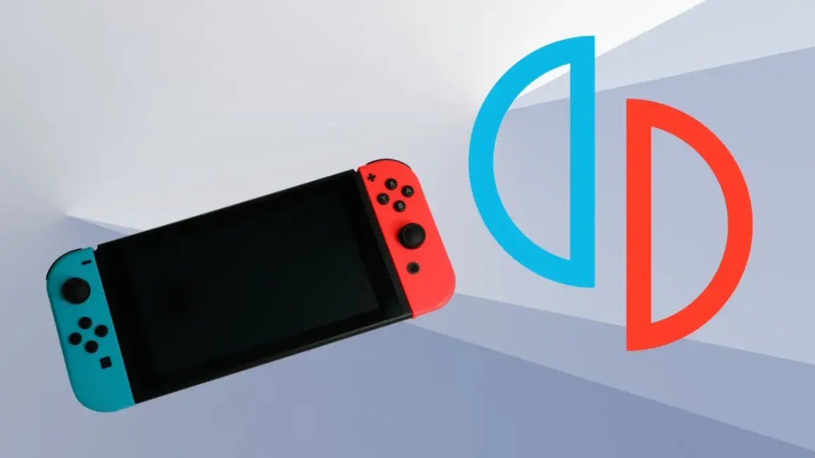 Konsola Nintendo Switch z niebieskim i czerwonym Joy-Conem obok symbolu podzielonego okręgu.