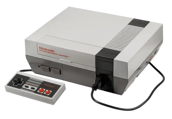 Klasyczna konsola Nintendo Entertainment System z padem. Wiele osób wspomina ją jako swoje pierwsze **stare gry na telefon**, choć to konsola.